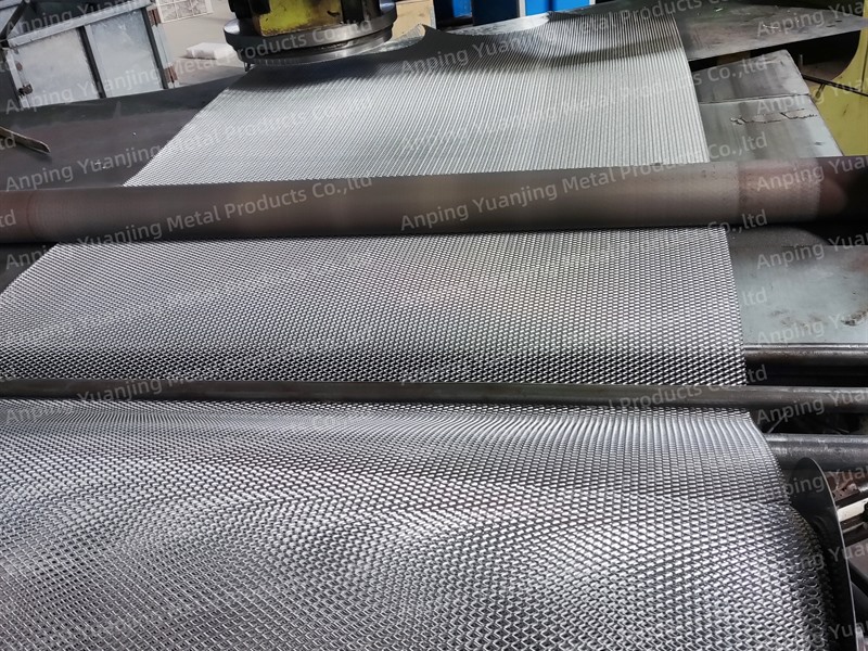 Industrial punching press producing expanded metal mesh sheets